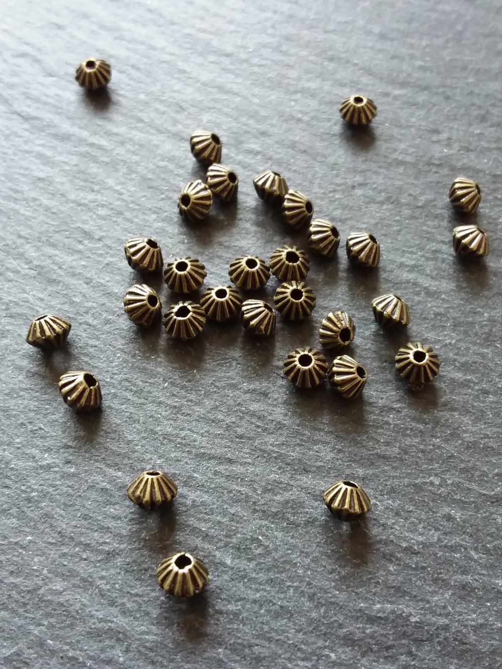 40 or 200 Bicone 5mm Antique Bronze Tone Striped Spacer Beads 5x4mm. Hole: 1mm - ContentedCatz