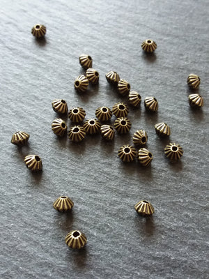 40 or 200 Bicone 5mm Antique Bronze Tone Striped Spacer Beads 5x4mm. Hole: 1mm - ContentedCatz