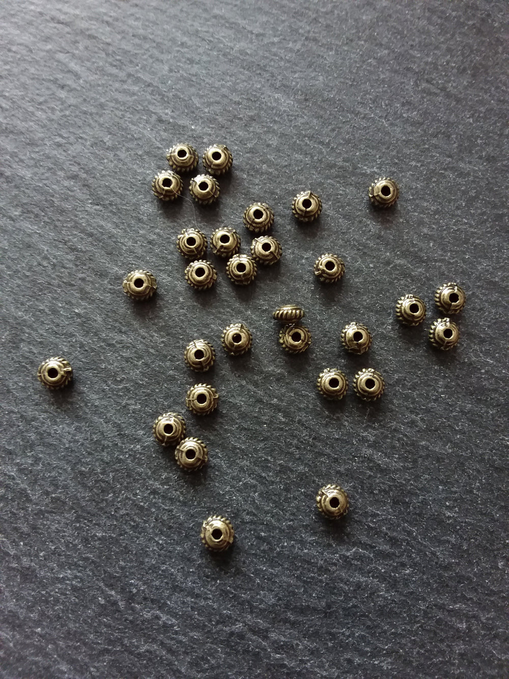 60 or 300 Antique Bronze Tone 5mm Diameter Wheel Spacer Beads Bali Style 5x3mm Hole: 1mm