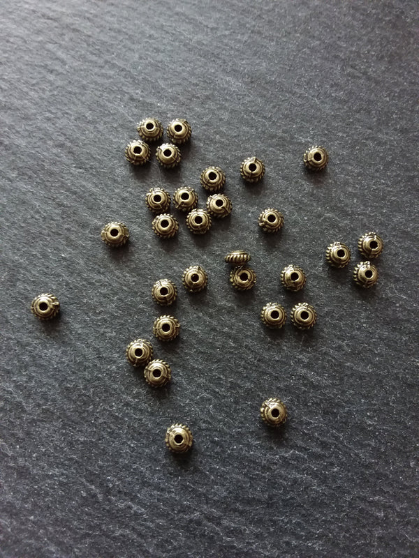 60 or 300 Antique Bronze Tone 5mm Diameter Wheel Spacer Beads Bali Style 5x3mm Hole: 1mm