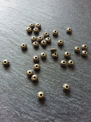 60 or 300 Antique Bronze Tone 5mm Diameter Wheel Spacer Beads Bali Style 5x3mm Hole: 1mm