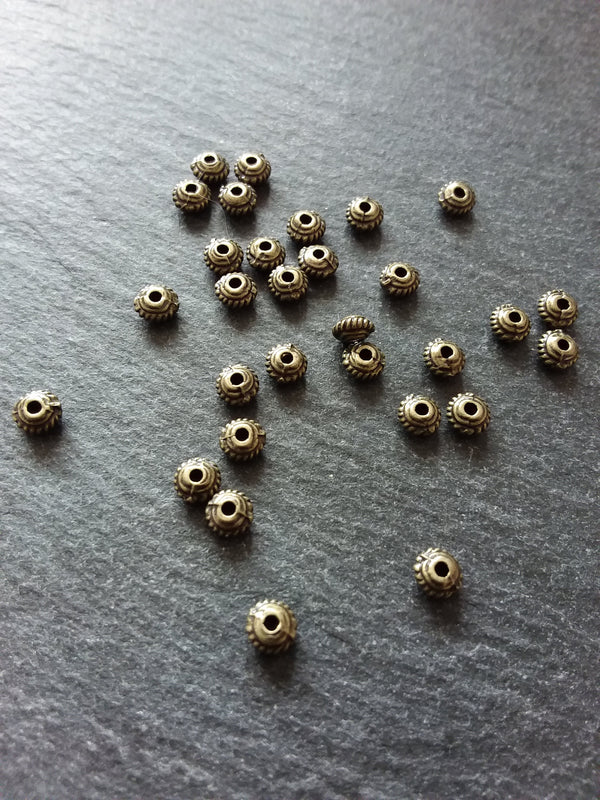 60 or 300 Antique Bronze Tone 5mm Diameter Wheel Spacer Beads Bali Style 5x3mm Hole: 1mm