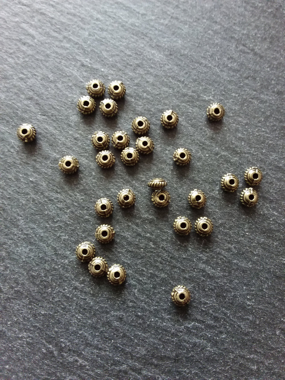 60 or 300 Antique Bronze Tone 5mm Diameter Wheel Spacer Beads Bali Style 5x3mm Hole: 1mm
