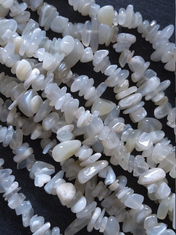 Natural Moonstone Rounded Chip Beads 5mm to 8mm. Full 33 inch Strand Hole: 1mm