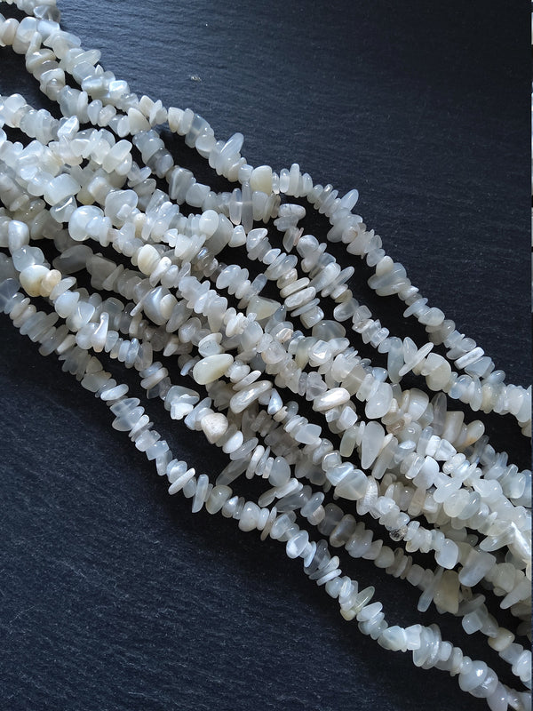 Natural Moonstone Rounded Chip Beads 5mm to 8mm. Full 33 inch Strand Hole: 1mm
