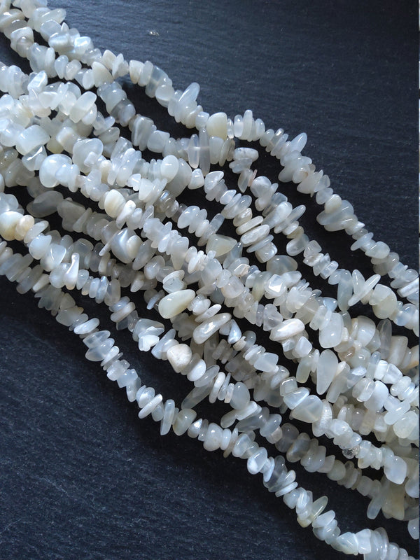 Natural Moonstone Rounded Chip Beads 5mm to 8mm. Full 33 inch Strand Hole: 1mm