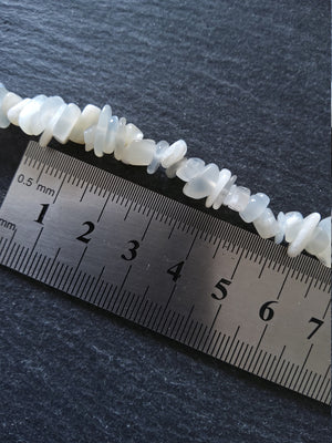 Natural Moonstone Rounded Chip Beads 5mm to 8mm. Full 33 inch Strand Hole: 1mm
