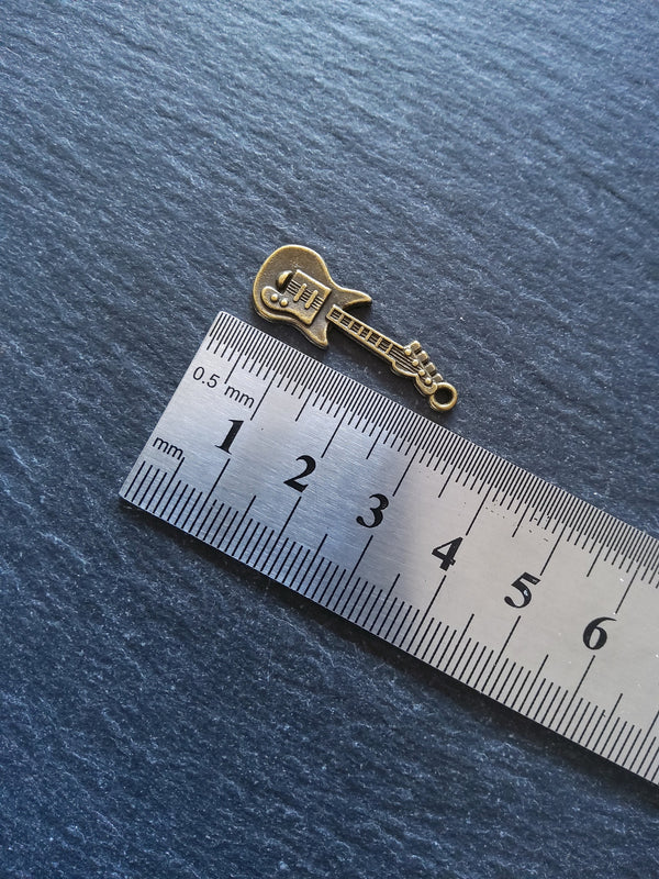 10 or 50 Guitar Charms Antique Bronze Tone 31x11x2mm