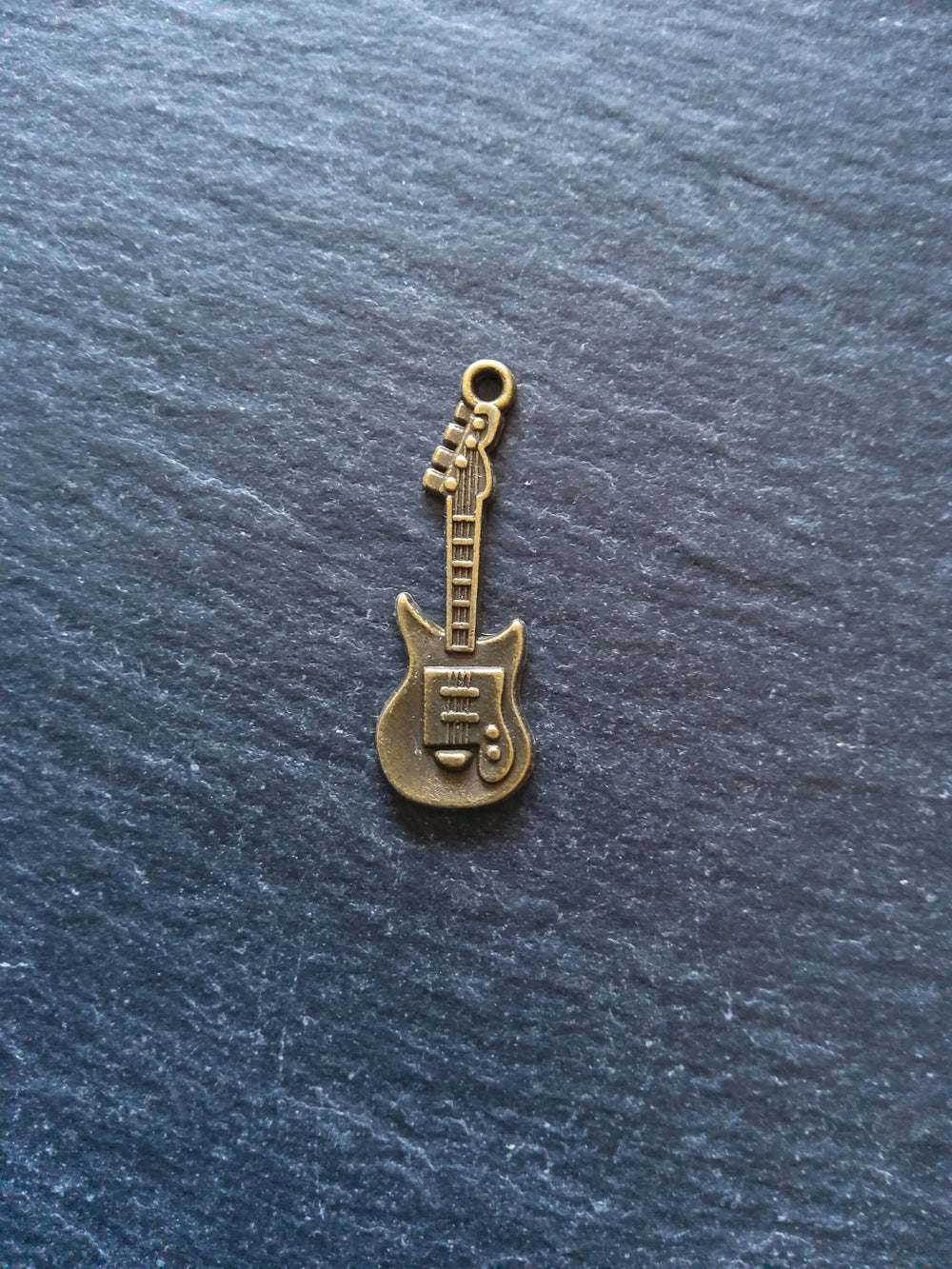 10 or 50 Guitar Charms Antique Bronze Tone 31x11x2mm