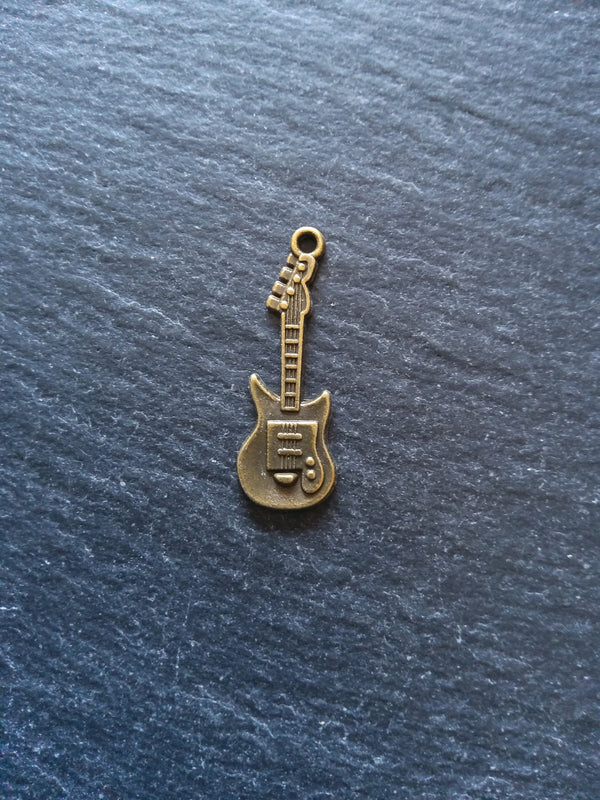10 or 50 Guitar Charms Antique Bronze Tone 31x11x2mm
