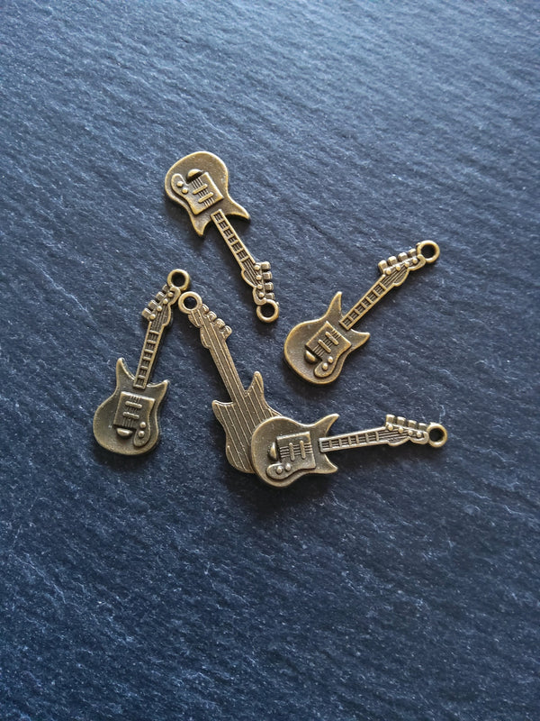 20 or 100 Guitar Charms Antique Bronze Tone Alloy 31x11x2mm