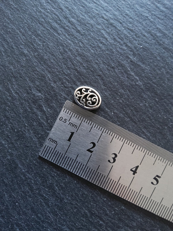 10 or 50 Flattened Oval Beads Antique Silver Tone 12x10mm 3.5mm Wide