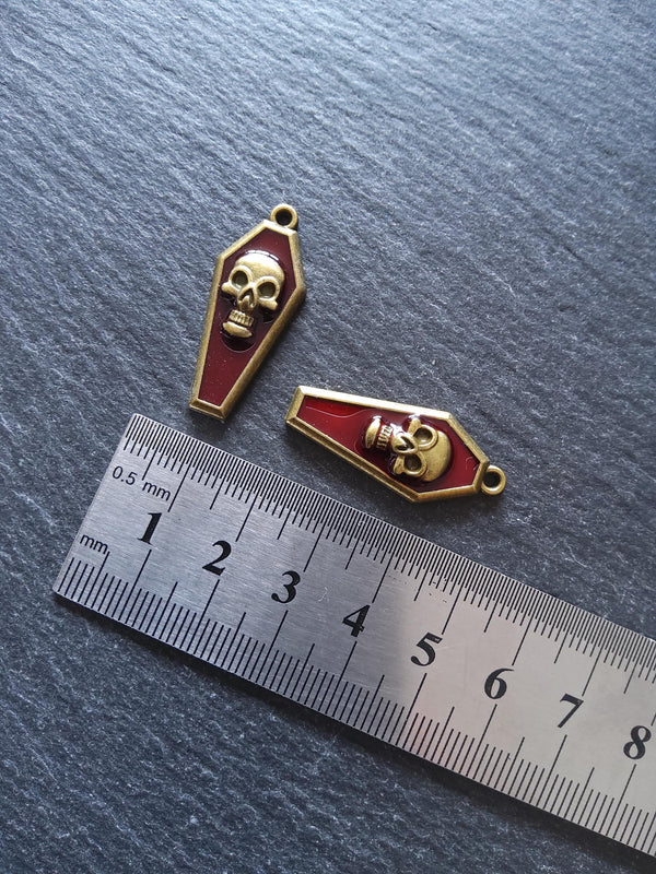 4 or 20 Coffin Shaped Antique Bronze Skull Charms with Red Enamel 32x13x4mm - ContentedCatz