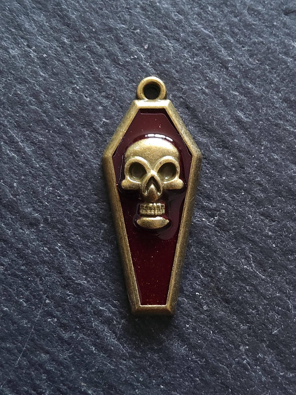 4 or 20 Coffin Shaped Antique Bronze Skull Charms with Red Enamel 32x13x4mm - ContentedCatz