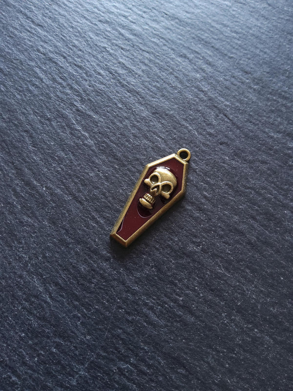 4 or 20 Coffin Shaped Antique Bronze Skull Charms with Red Enamel 32x13x4mm - ContentedCatz
