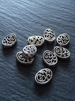10 or 50 Flattened Oval Beads Antique Silver Tone 12x10mm 3.5mm Wide