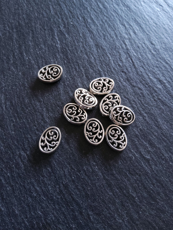 10 or 50 Flattened Oval Beads Antique Silver Tone 12x10mm 3.5mm Wide