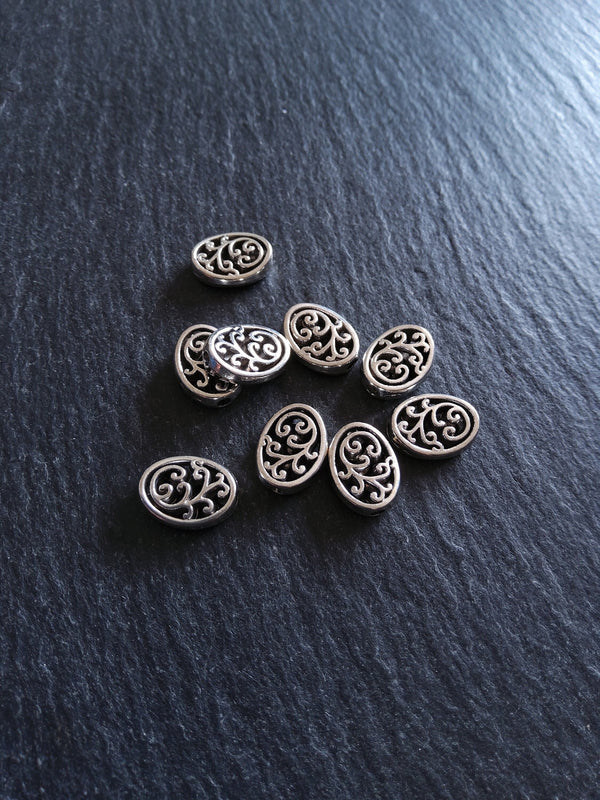 10 or 50 Flattened Oval Beads Antique Silver Tone 12x10mm 3.5mm Wide