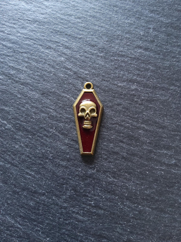 4 or 20 Coffin Shaped Antique Bronze Skull Charms with Red Enamel 32x13x4mm - ContentedCatz