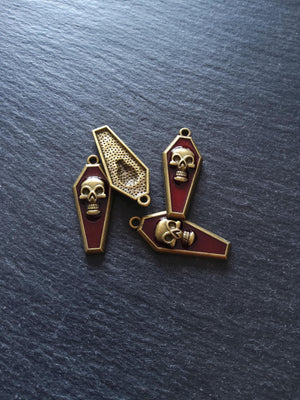 4 or 20 Coffin Shaped Antique Bronze Skull Charms with Red Enamel 32x13x4mm - ContentedCatz