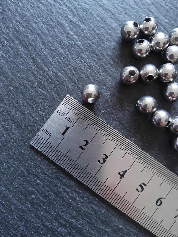 10 or 50 Stainless Steel 8mm Hollow Round Spacer Beads Non-Tarnish. Hole 2.9mm