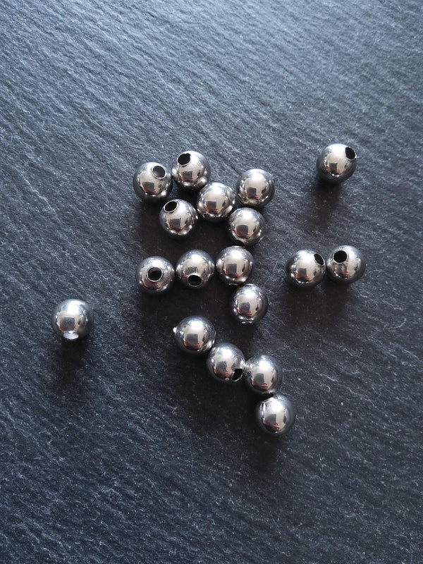 10 or 50 Stainless Steel 8mm Hollow Round Spacer Beads Non-Tarnish. Hole 2.9mm