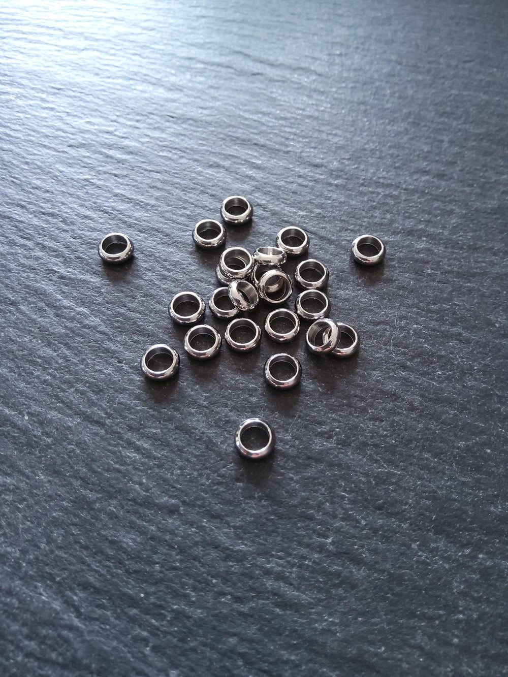 10 or 50 Stainless Steel 6mm Solid Round CLOSED Ring Spacer Beads 6x2mm. Hole: 4mm Non-Tarnish