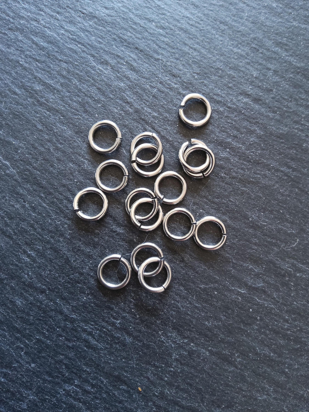 40 or 200 Stainless Steel 9mm Jump Rings Opened Strong 1.5mm (15 gauge)