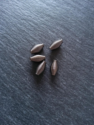 20 Gunmetal Tone 7mm Bicone Wire Spring Spacer Beads 12x7mm Hole: 2.7mm - ContentedCatz