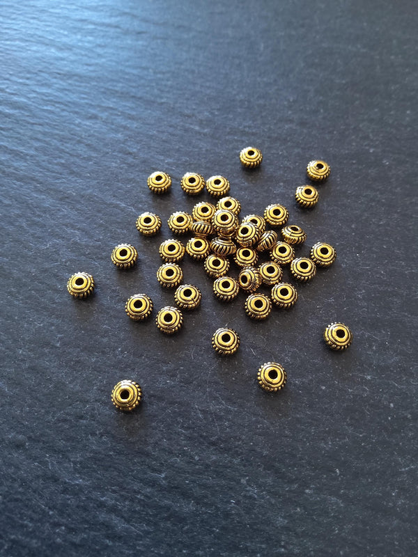 60 or 300 Antique Gold Tone 5mm Diameter Wheel Spacer Beads Bali Style 5x3mm Hole: 1mm