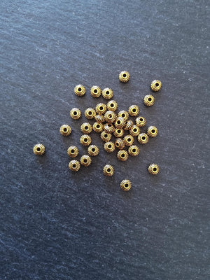 60 or 300 Antique Gold Tone 5mm Diameter Wheel Spacer Beads Bali Style 5x3mm Hole: 1mm