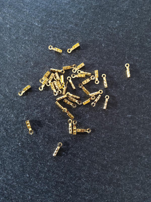 60 or 300 Gold Plated Brass Folding Crimp Ends 7.5x2.5mm For 1mm Cord. Hole: 1mm