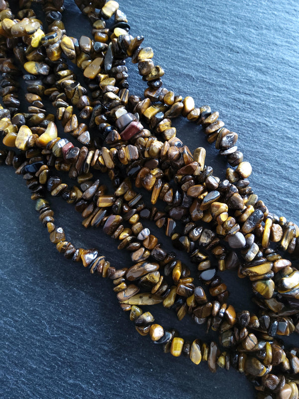 Natural Tigers Eye Rounded Chip Gemstone Beads. Long 80cm Strand. Approx. 5x10x3mm chips