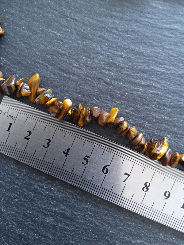 Natural Tigers Eye Rounded Chip Gemstone Beads. Long 80cm Strand. Approx. 5x10x3mm chips