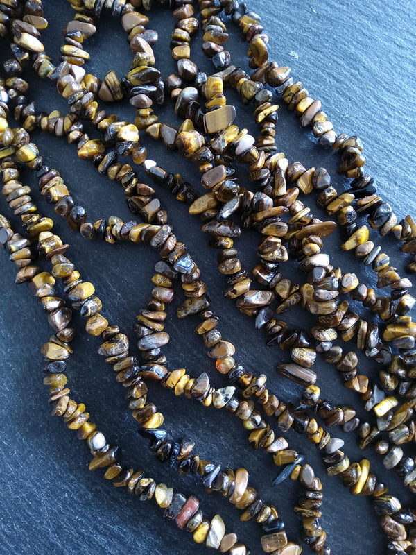Natural Tigers Eye Rounded Chip Gemstone Beads. Long 80cm Strand. Approx. 5x10x3mm chips