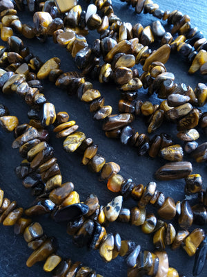 Natural Tigers Eye Rounded Chip Gemstone Beads. Long 80cm Strand. Approx. 5x10x3mm chips