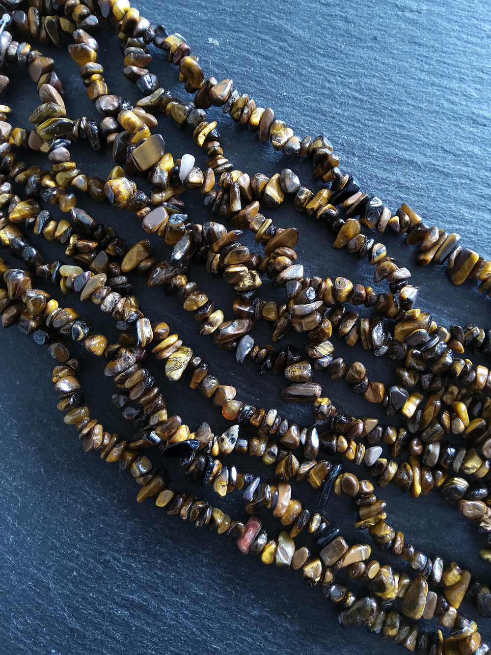 Natural Tigers Eye Rounded Chip Gemstone Beads. Long 80cm Strand. Approx. 5x10x3mm chips
