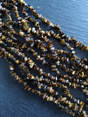 Natural Tigers Eye Rounded Chip Gemstone Beads. Long 80cm Strand. Approx. 5x10x3mm chips