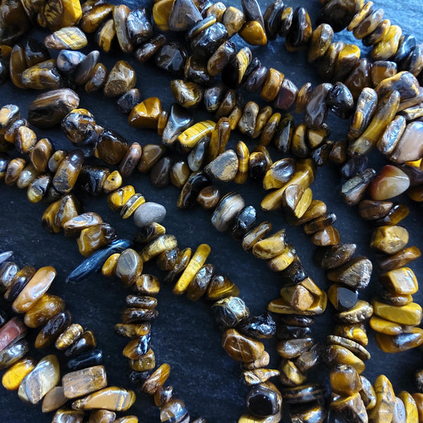 Natural Tigers Eye Rounded Chip Gemstone Beads. Long 80cm Strand. Approx. 5x10x3mm chips