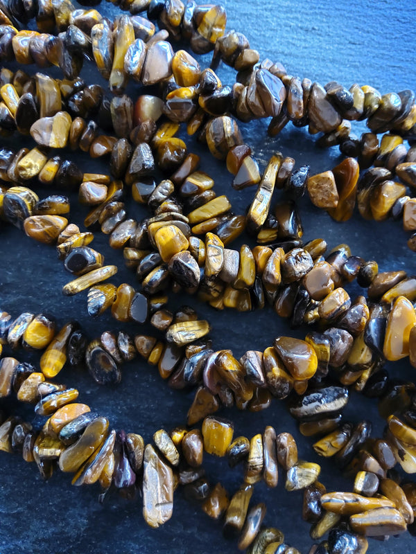 Natural Tigers Eye Rounded Chip Gemstone Beads. Long 80cm Strand. Approx. 5x10x3mm chips